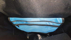 Elife vanntett sykkelveske til elsykkel på et bord der man ser lommene på innsiden av vesken