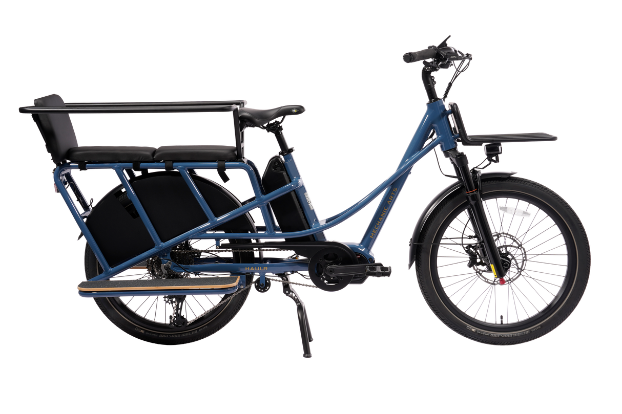 Mechanic Arts Haulr elsykkel med kjededrift, barnegrind og fotbrett – familievennlig longtail med barnesikring og passasjerutstyr